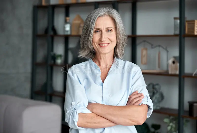 files/smiling-confident-middle-aged-woman-standing-arms-crossed-office-portrait-smiling-confident-stylish-mature-middle-aged-woman-196805614.webp